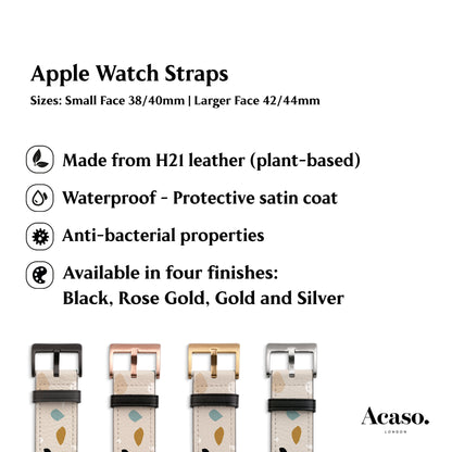 a white apple watch strap with gold and silver details