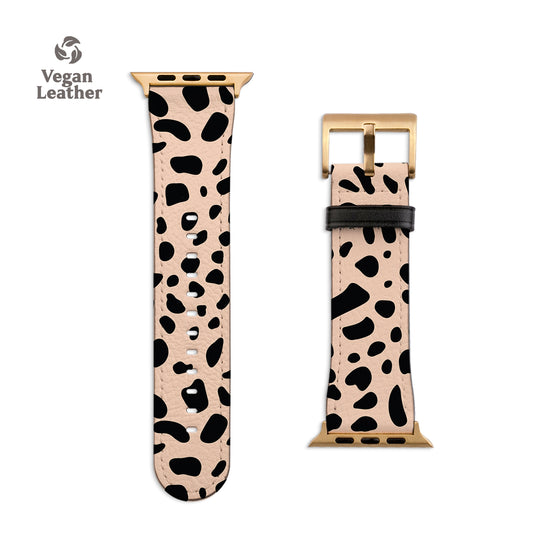 a leopard print watch strap with a gold buckle