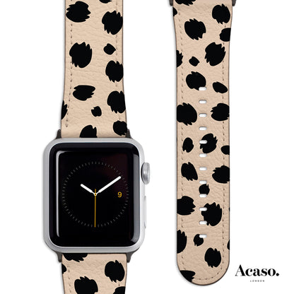 an apple watch with a black and white pattern